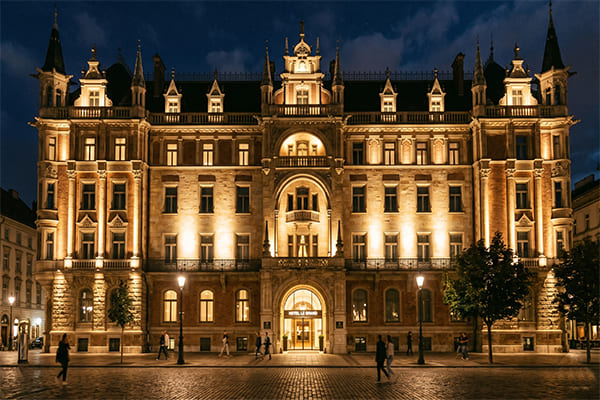 A beautifully lit building facade showing a mix of narrow and wide beam lighting effects