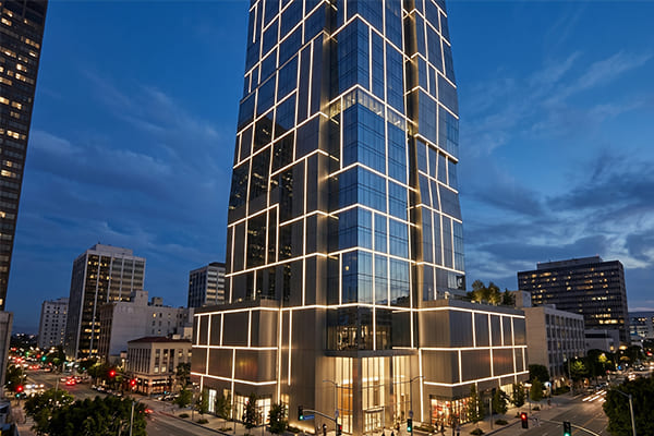 A building facade with integrated lighting channels for a seamless look