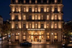 A beautifully lit hotel facade at night without excessive glare